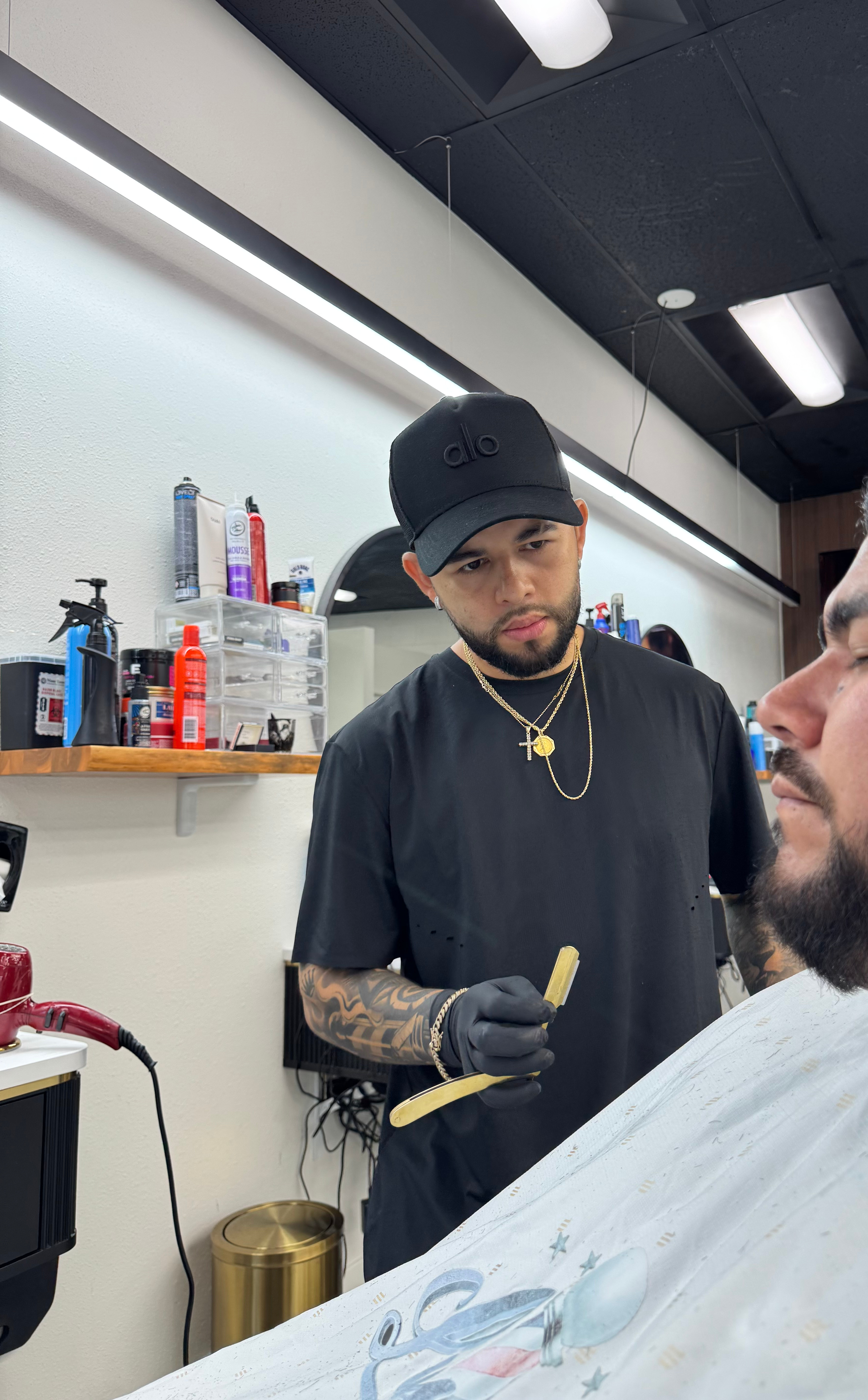 Melvin - Owner and Master Barber at Luxury Cuts 1
